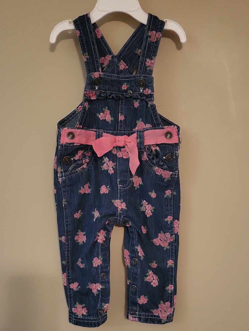 Adorable toddler floral denim overalls with pink bow